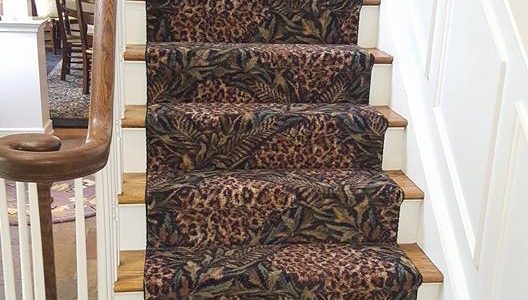 Stairs with a leopard print carpet
