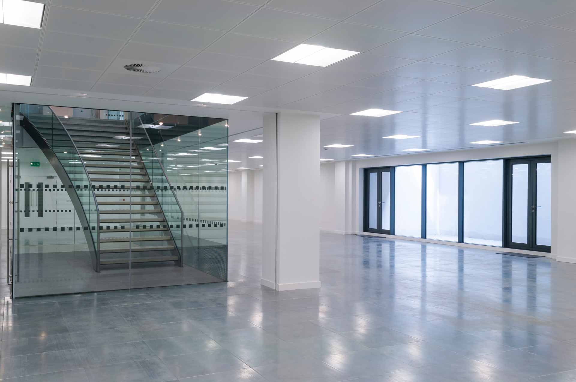 Office space with grey linoleum floors